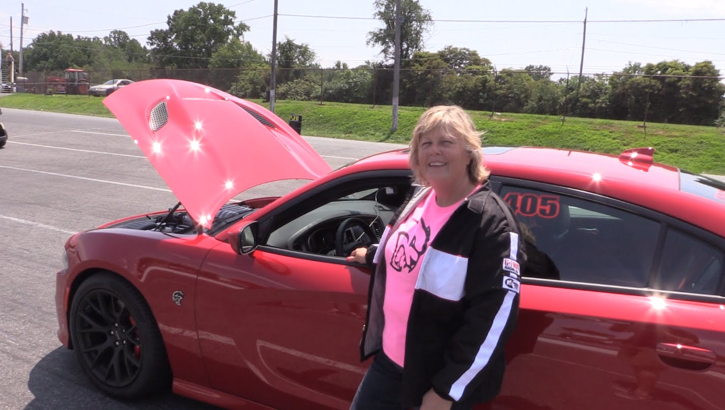 Watch this Charger Hellcat run 10.6 @ 130MPH, driven by a female.